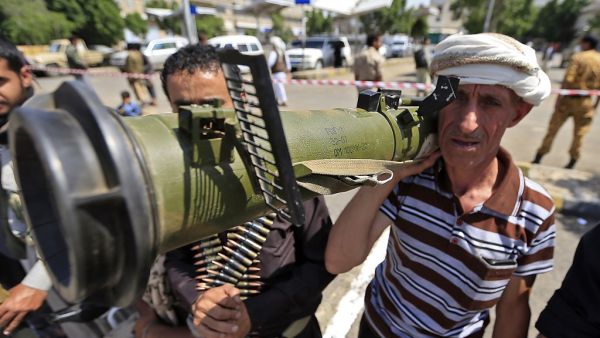 A Yemeni gunman loyal to the Huthi movement brandishes an anti-tank weapon during a rally in the capital Sanaa, to show support to the movement against the Saudi-led intervention in the country on July, 7, 2020. Mohammed HUWAIS / AFP
