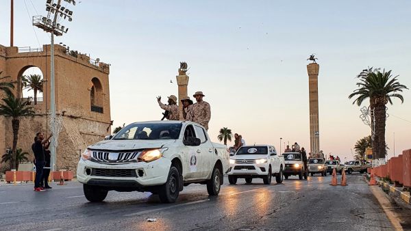Vehicles of the "Tripoli Brigade", a militia loyal to the UN-recognised Government of National Accord (GNA), parade through the Martyrs' Square at the centre of the GNA-held Libyan capital Tripoli on July 10, 2020. Mahmud TURKIA / AFP