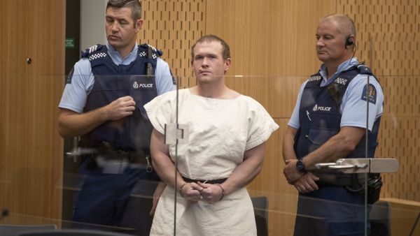 This file picture taken on March 16, 2019 shows Brenton Tarrant (C), the man charged in relation to the Christchurch massacre, standing in the dock during his appearance at the Christchurch District Court. Australian national Brenton Tarrant, the gunman behind New Zealand's Christchurch mosque shootings, sacked his lawyers on July 13, 2020 and opted to represent himself, raising fears he would use a sentencing hearing next month to promote his white-supremacist views. Mark Mitchell / POOL / AFP