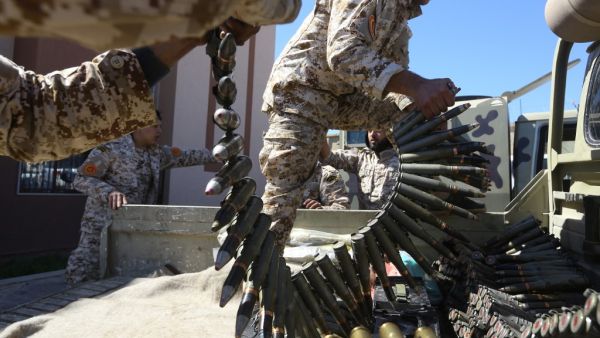 In this file photo taken on April 08, 2019, fighters from a Misrata armed group loyal to the internationally recognised Libyan Government of National Accord (GNA) prepare their ammunition before heading to the frontline as battles against Forces of Libyan strongman Khalifa Haftar, in Tripoli The US charged on July 16, 2020, that the EU's Operation Irini to enforce a UN embargo on sending weapons to war-torn Libya lacked seriousness, sharing Turkey's criticism that the effort is biased. Mahmud TURKIA / AFP