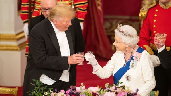 President Trump and Queen Elizabeth II shared a toast during his official visit to the United Kingdom. (DOMINIC LIPINSKI/AFP/Getty Images)