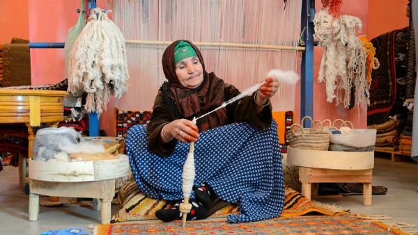 Woman spining a woolen string for berber. (Shutterstock/ File Photo)
