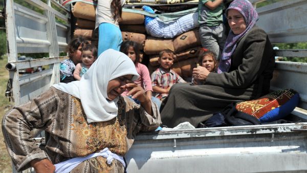 unidentified Syrian refugees, protested at the syria border June 11, 2011 on the Turkish - Syrian border. (Shutterstock/ File Photo)