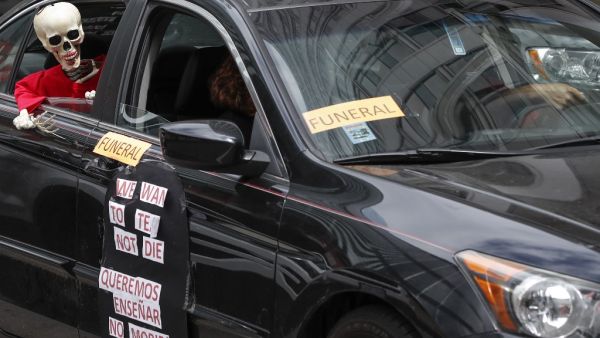 Teachers and activists hold car caravan all over the country on August 3, 2020 to demand adequate classroom safety measures as schools debate reopening. KAMIL KRZACZYNSKI / AFP