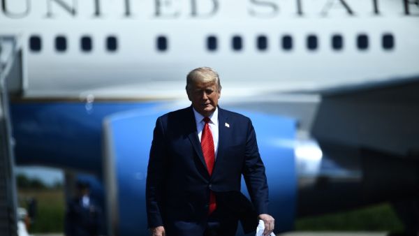 US President Donald Trump arrives to deliver remarks on the economy at Mankato Regional Airport on August 17, 2020 in Mankato, Minnesota. Brendan Smialowski / AFP