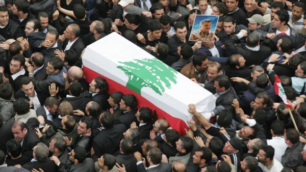 In this file photo taken on February 16, 2005, hundreds of thousands of mourners join the funeral procession of Lebanon's slain former prime minister Rafiq Hariri in central Beirut. Joseph BARRAK / AFP