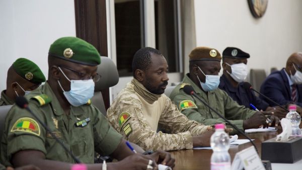 President of the CNSP (National Committee for the Salvation of the People) Assimi Goita (C) prepares for a meeting between Malian military leaders and an ECOWAS delegation headed by former Nigerian president on August 22, 2020, in an aim to restore order after the military coup in Bamako. ANNIE RISEMBERG / AFP