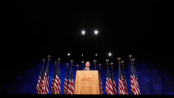  Democratic presidential nominee Joe Biden delivers his acceptance speech on the fourth night of the Democratic National Convention from the Chase Center on August 20, 2020 in Wilmington, Delaware. The convention, which was once expected to draw 50,000 people to Milwaukee, Wisconsin, is now taking place virtually due to the coronavirus pandemic. Win McNamee/Getty Images/AFP WIN MCNAMEE / GETTY IMAGES NORTH AMERICA / Getty Images via AFP