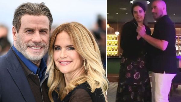 جون ترافولتا وزوجته كيلي 