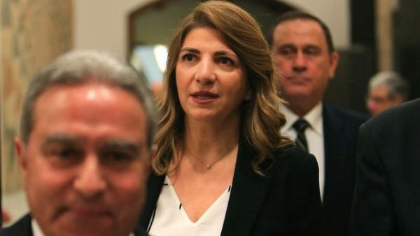 Lebanese Justice Minister Marie Claude Najm, center, cited the catastrophic Beirut explosion as her reason for resigning. (AFP file photo)