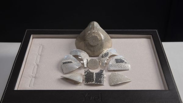 The mask is constructed with 18-karat white gold mask will be decorated with 3,600 white and black diamonds. (Twitter)