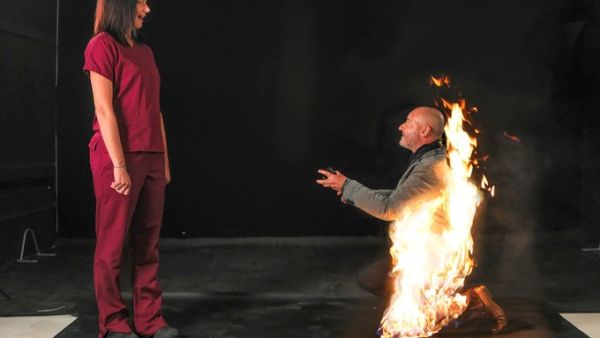 Professional stuntman proposes to his girlfriend while on fire (Twitter)