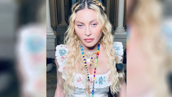 Madonna celebrates 62nd birthday with tray of marijuana and joint hanging from lips in Jamaica with beau Ahlamalik Williams