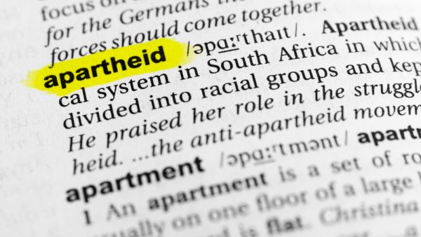 Highlighted English word "apartheid" and its definition in the dictionary. (Shutterstock/ File Photo)