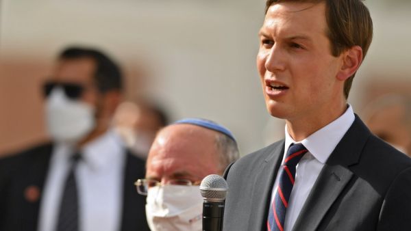 US Presidential Adviser Jared Kushner speaks near Head of Israel's National Security Council Meir Ben-Shabbat at Abu Dhabi airport following the arrival of the first-ever commercial flight from Israel to the UAE, on August 31, 2020. KARIM SAHIB / AFP