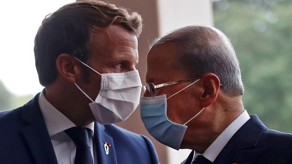 French President Emmanuel Macron (L) meets with Lebanese President Michel Aoun at the Presidential palace in Baabda, east of the Lebanese capital Beirut, on September 1, 2020. GONZALO FUENTES / POOL / AFP