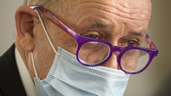 French Minister of Europe and Foreign Affairs Jean-Yves Le Drian, wearing a face mask, attends a meeting with his Slovenian counterpart in Ljubljana on September 3, 2020. Jure Makovec / AFP