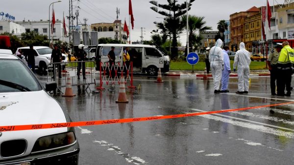 Tunisian forensic police investigate the site of an attack on Tunisian National Guard officers on September 6, 2020, in Sousse, south of the capital Tunis. Attackers with knives killed a Tunisian National Guard officer and wounded another before three assailants were shot dead in a firefight, the security force said, labelling it a "terrorist attack". The attack took place in the tourist district of the coastal city of Sousse, the site of the worst of several jihadist attacks in recent years, where 38 peopl