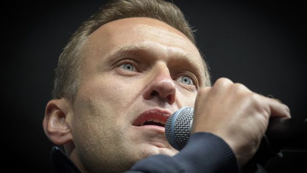 This file photo taken on September 29, 2019 shows Russian opposition leader Alexei Navalny delivering a speech during a demonstration in Moscow. Russian opposition leader Alexei Navalny, who Germany says was poisoned by a weapons-grade Novichok nerve agent, is now out of a medically induced coma and is being weaned off mechanical ventilation, the Berlin hospital treating him said on September 7, 2020. Yuri KADOBNOV / AFP