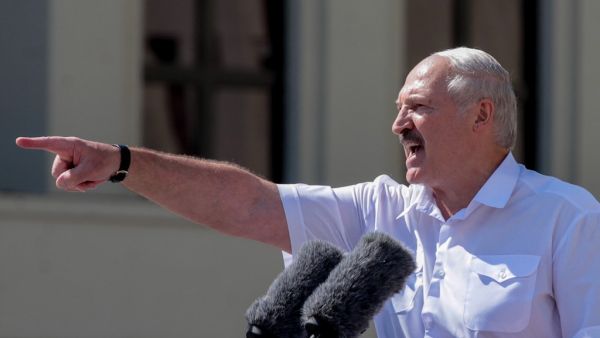 In this file photo taken on August 16, 2020 Belarus' President Alexander Lukashenko gestures as he delivers a speech during a rally held to support him in central Minsk. Belarusian President Alexander Lukashenko on September 8, 2020 suggested that Russia would be next if his regime falls in the face of a wave of mass demonstrations. "You know what we concluded with the Russian establishment and leadership? If Belarus falls, Russia will be next," state news agency RIA Novosti quoted Lukashenko as saying in a
