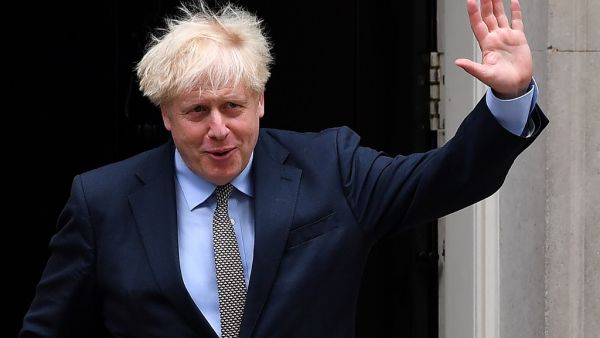 Britain's Prime Minister Boris Johnson waves as he leaves 10 Downing Street in central London on September 9, 2020, to attend Prime Minister's Questions (PMQs) at the House of Commons. Ben STANSALL / AFP