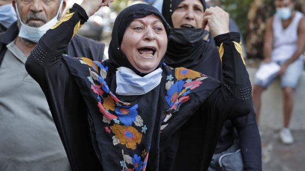 Relatives of inmates at Roumieh prison stage a demonstration outside the ministry of justice in the Lebanese capital Beirut on September 14, 2020, calling for a general amnesty and for the protection of prisoners following the spread of COVID-19 in the facility. ANWAR AMRO / AFP