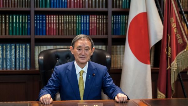 Japan's ruling party on September 14 elected chief cabinet secretary Yoshihide Suga its new leader, making him all but certain to replace Shinzo Abe as the country's next prime minister. Nicolas Datiche / POOL / AFP