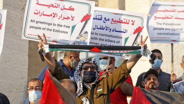 Palestinians protest in Rafah in the southern Gaza Strip against Israeli normalisation deals with the United Arab Emirates and Bahrain on September 15, 2020, hours ahead of a signing ceremony at the White House. SAID KHATIB / AFP