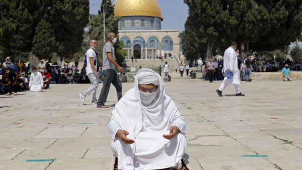 A Palestinian Muslim worshipper prays at the al-Aqsa mosque compound in the old city of Jerusalem on September 18, 2020. (AFP)