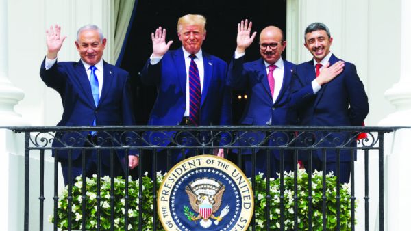 President Donald Trump hosted Israeli Prime Minister Benjamin Netanyahu, far left, and the foreign ministers of Bahrain and the UAE, Abdullatif bin Rashid Al-Zayani and Abdullah bin Zayed Al-Nahyan, at the White House for the signing ceremony on Tuesday. (AFP)