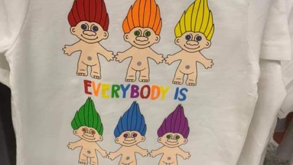 A mother has called for a boycott of Asda and branded the supermarket 'disgusting' for 'promoting paedophilia' by selling children's T-shirts with LGBT flag colours and naked trolls with the slogan 'everybody is free to love' (Twitter)