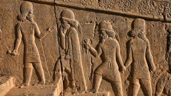 A stone chip of guests who have come to congratulate the Achaemenid king. (Shutterstock/ File Photo)