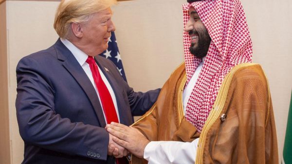 US President Donald Trump shakes hands with Mohammed bin Salman at 2019 G20 Summit in Osaka, Japan (AFP photo/Saudi Royal Palace/Bandar al-Jaloud)