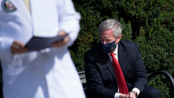 Sean Conley, Physician to US President Donald Trump, and White House Chief of Staff Mark Meadows(R) listen while an update on the President's health as he is treated for a COVID-19 infection at Walter Reed Medical Center October 4, 2020, in Bethesda, Maryland. US President Donald Trump has "continued to improve" as he is treated for Covid-19, his doctors said October 4, 2020, revealing he could be discharged as early as October 5, 2020. His medical team said his oxygen levels had dropped twice briefly in re