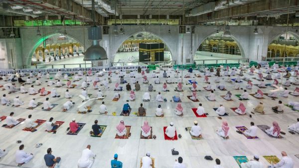 Saudi Arabia opened Islam's holiest site for prayers for the first time in seven months, and expanded the umrah pilgrimage to accommodate 15,000 worshippers as it relaxed coronavirus curbs. STR / AFP