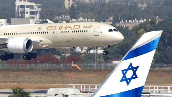 An Etihad Airways plane carrying a delegation from the United Arab Emirates (UAE) on a first official visit, lands at at Israel's Ben Gurion Airport near Tel Aviv, on October 20, 2020. The UAE delegation left on the country's first official visit to Israel with a string of deals set to be signed after the two countries signed a deal to normalise ties last month. JACK GUEZ / AFP