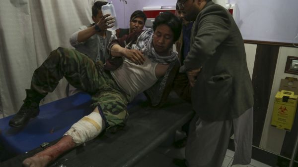 A wounded man receives treatment in a hospital following a suicide bomber blew himself up in an education centre, in Kabul on October 24, 2020. A suicide bomber struck near an education centre in the Afghan capital on October 24, killing at least 18 people in the latest attack to rock the conflict-wracked country. AFP