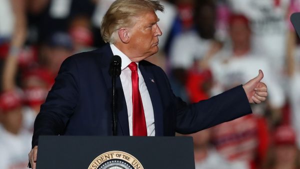 President Donald Trump speaks during his campaign event at the Orlando Sanford International Airport on October 12, 2020 in Sanford, Florida. (AFP)