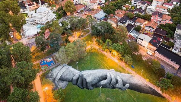 Beyond Walls Step 8: Istanbul. 6300m2, three pieces, biodegradable paint on grass, 2020. (Instagram)