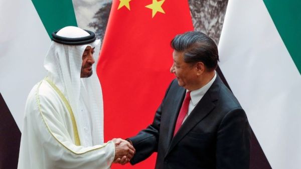 During his meeting with Crown Prince Mohammed bin Zayed al-Nahyan, China's President Xi Jinping thanked the UAE for its "valuable support" on Xinjiang (AFP Photo/Andy Wong)