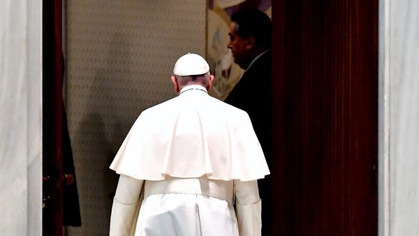 Pope Francis leaves at the end of weekly general audience in the Paul VI hall at the Vatican, on October 28, 2020. Tiziana FABI / AFP