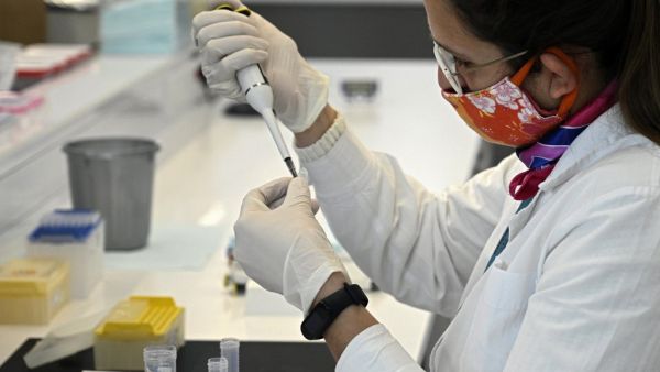 In this file photo taken on August 14, 2020 a scientist works at the mAbxience biosimilar monoclonal antibody laboratory plant in Garin, Buenos Aires province, where an experimental coronavirus vaccine will be produced for Latin America. (AFP)