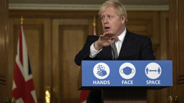 UK Prime Minister Boris Johnson on Saturday announced a new four-week coronavirus lockdown across England, a dramatic strategy shift following warnings hospitals would become overwhelmed under his current system of localised restrictions. Alberto Pezzali / POOL / AFP
