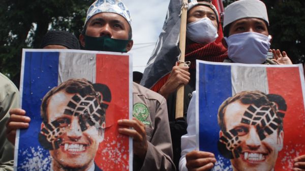 Muslim protesters gather to protest against French President Emmanuel Macron outside the French Institute in Bandung on November 2, 2020. Timur Matahari / AFP