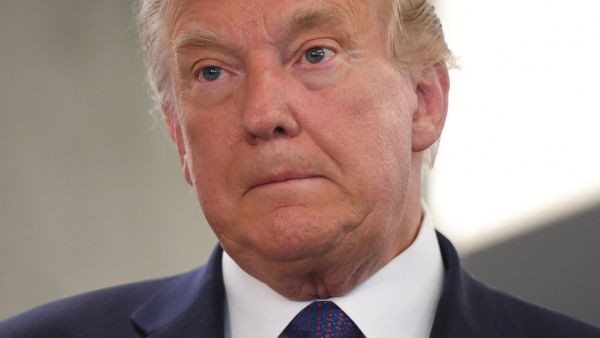 US President Donald Trump visits his campaign headquarters in Arlington, Virginia, November 3, 2020. A bitterly divided America was going to the polls on Tuesday amid the worst pandemic in a century and an economic crisis to decide whether to give President Donald Trump four more years or send Democrat Joe Biden to the White House. A record-breaking number of early votes -- more than 100 million -- have already been cast in an election that has the nation on edge and is being closely watched in capitals aro