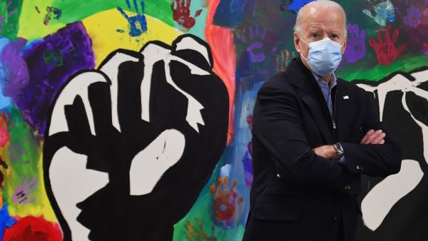 Democratic presidential candidate Joe Biden visits The Warehouse for teens by teens in Wilmington, Delaware on November 3, 2020. The US started voting Tuesday in an election amounting to a referendum on Donald Trump's uniquely brash and bruising presidency, which Democratic opponent and frontrunner Joe Biden urged Americans to end to restore "our democracy." Angela Weiss / AFP