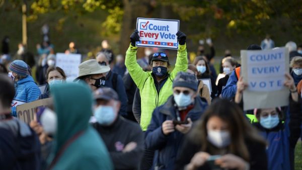 Democrats and Republicans were gearing up Wednesday for a possible legal showdown to decide the winner of the tight presidential race between Republican Donald Trump and Democratic challenger Joe Biden. Joseph Prezioso / AFP