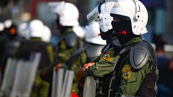 Iraqi riot policemen stand guard during an anti-government protest over corruption and poor services in Tahrir Square in the centre of the capital Baghdad on November 8, 2020. AHMAD AL-RUBAYE / AFP