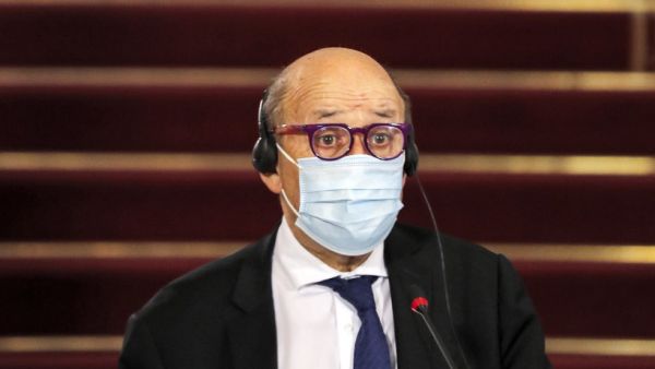 France's Minister of Europe and Foreign Affairs Jean-Yves Le Drian and the Egyptian foreign minister, mask-clad due to the COVID-19 coronavirus pandemic, give a joint press conference after their meeting at Tahrir Palace in the centre of the capital Cairo on November 8, 2020. Khaled DESOUKI / AFP