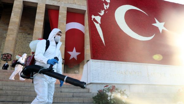 Municipal workers disinfect an area around the mausoleum of modern Turkey's founder, Mustafa Kemal Ataturk, during a memorial ceremony on the 82nd anniversary of his death, in Ankara, on November 10, 2020, amid the sanitary crisis linked with the Covid-19 pandemic caused by the novel coronavirus. Adem ALTAN / AFP